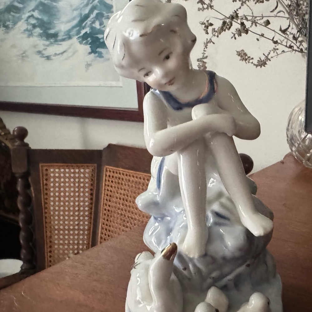 Beautiful White and Blue porcelain girl w/swans Figurine